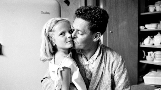 Mr Tom Hughes at home with daughter Lucy in 1963, the morning after winning the seat of Parkes in the Federal Election. He would serve as the Federal Attorney General in the Gorton Government and in later life became a noted member of the legal profession.