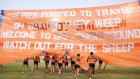 The Giants run through their banner for the opening of the 2024 season.