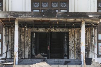 The fire caused significant damage to the old doors, the portico and the building's facade.