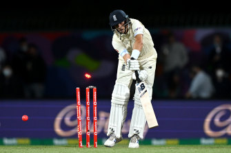 Joe Root is bowled by Scott Boland.