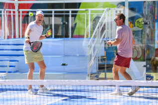 Dusty Allen, left, and Matt Thomas demonstrate the sport of padel at Melbourne Park.