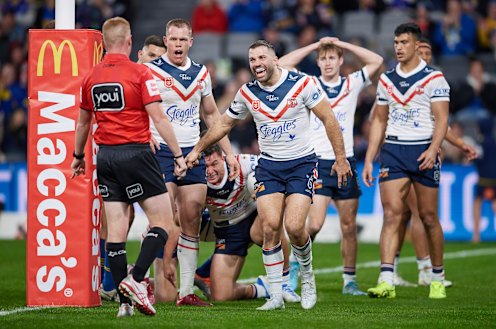 Roosters captain James Tedesco remonstrates with the referee.