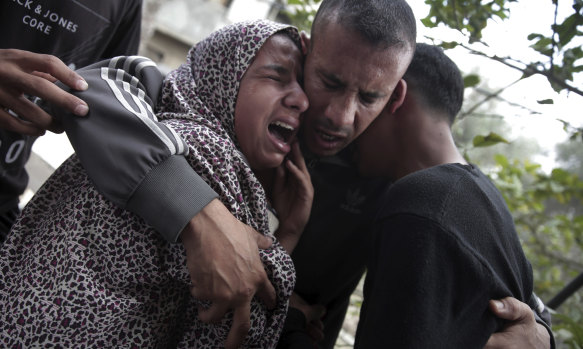Relatives of 40-year-old Palestinian Jaber Abu Mustafa attend his funeral in the town of Khan Younis in the Gaza Strip. He was killed after Israeli troops fired live bullets across the border fence into Gaza during a protest.