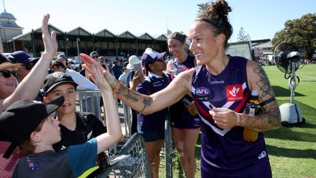 Meet and greet: Mia-Rae Clifford with Dockers fans after the win at Fremantle Oval.