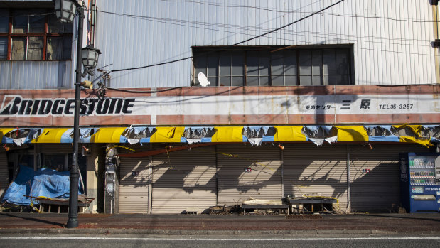 An abandoned bicycle shop in Namie, a town too close to the ill-fated Fukushima nuclear plant. 