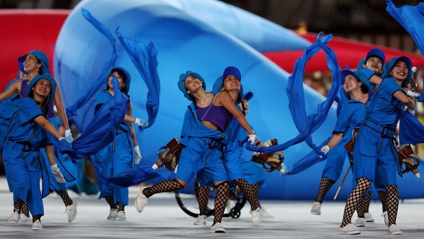 Entertainers perform during the opening ceremony. 