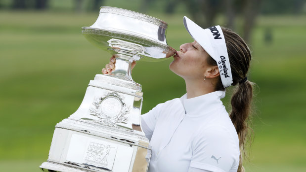 Bright future: Hannah Green kisses the trophy after her major victory.