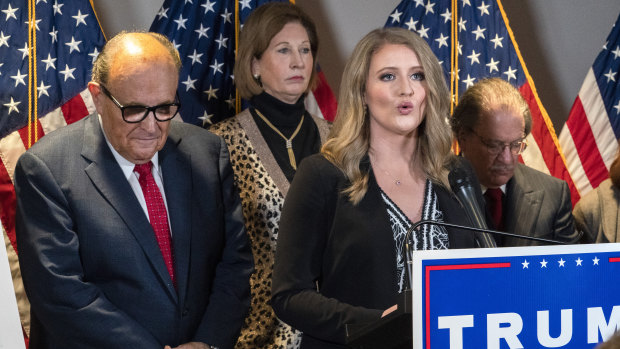 Past and present members of legal Team Trump: from left, Rudy Giuliani, Sidney Powell and Jenna Ellis.