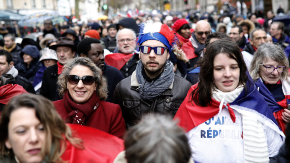 'Red scarves' protesters in Paris on Sunday.