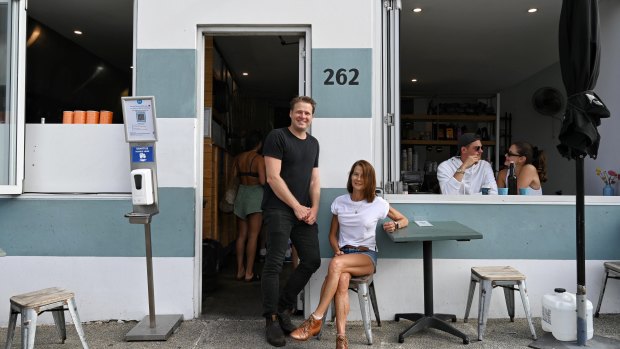 Owner of The Depot cafe in Bondi Clint Turland, pictured with his mother Heather, says he hopes the $100 hospitality and entertainment vouchers will spur local business. 