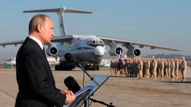 Russian President Vladimir Putin addressing the troops at the Hemeimeem air base in Syria in December 2017.