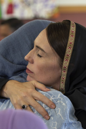 Jacinda Ardern comforts a member of Christchurch's Muslim community just after the attack.