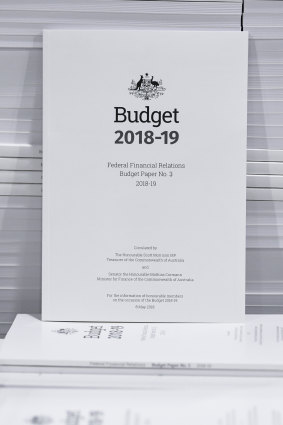 The cover of the 2018-19 Budget papers is seen at Canprint in Canberra.