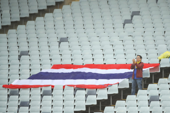 This hardy Thai fan braved the rain to cheer on his nation at Campbelltown Stadium.