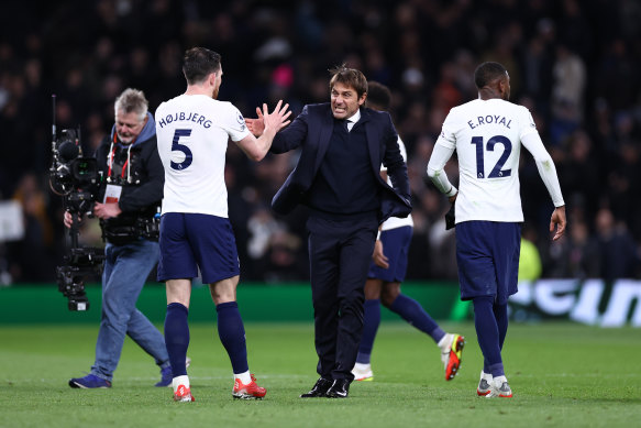 Antonio Conte celebrates victory after his first Premier League game in charge of Tottenham.