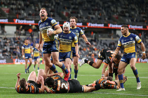 Andrew Davey celebrates a try (later disallowed) against Wests Tigers in September.