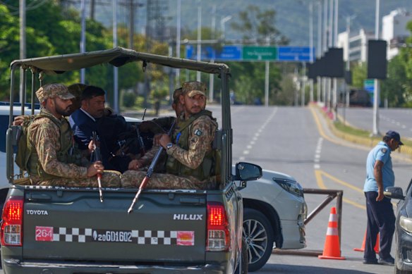 Army troops patrol at a road to ensure security ahead of the second round of peace talks. 