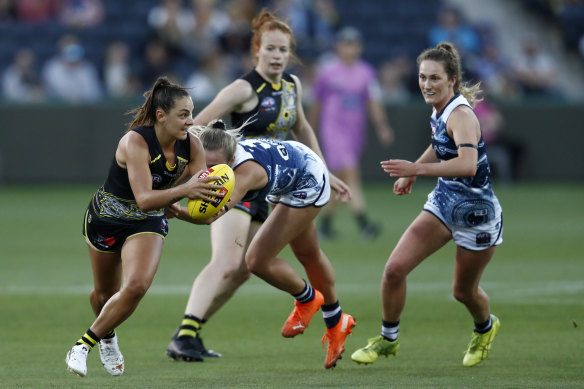 Richmond’s Monique Conti looks to get the ball away against Geelong.