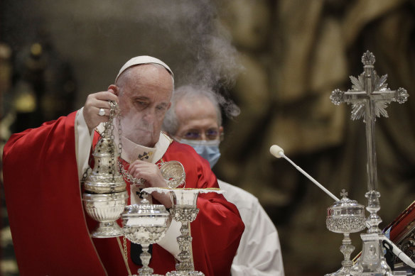 Pope Francis celebrates a mass for deceased prelates in St Peter's Basilica, at the Vatican.