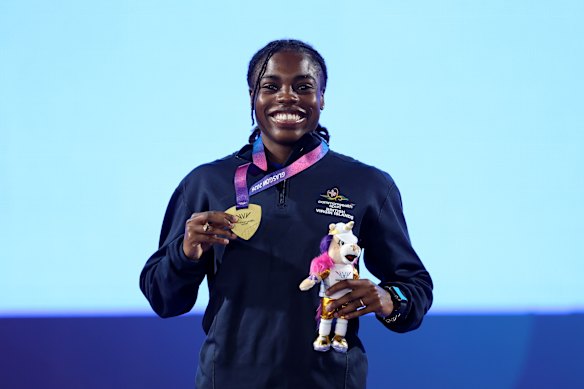 Hodge with her gold medal for the 200m.
