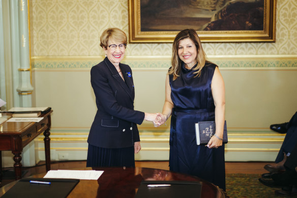 Sophie Cotsis, right, is sworn in by Governor of NSW Margaret Beazley earlier this month.