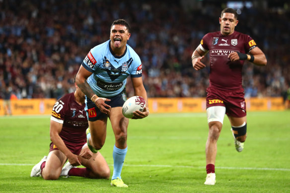 Latrell Mitchel celebrates after scoring a try during Origin game two last year.