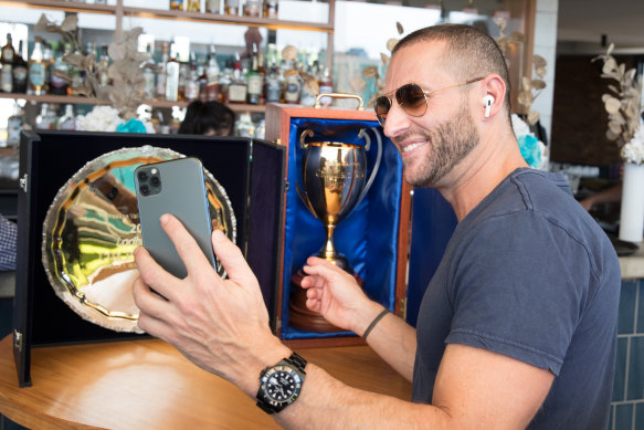Brae Sokolski, who owns Verry Elleegant, Sir Dragonet and Finche, grabs a selfie with the Caufield Cup.