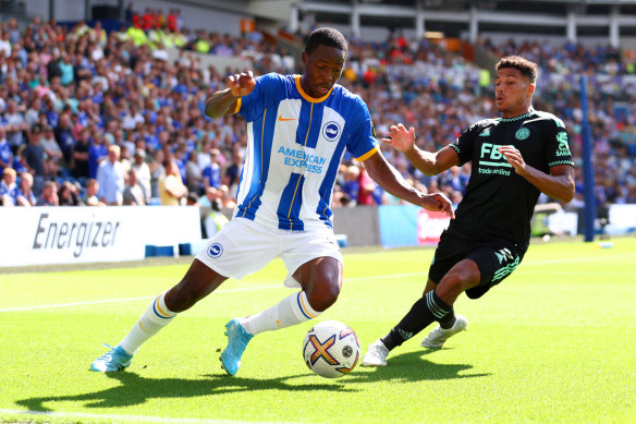 Brighton’s Enock Mwepu is challenged by Leicester’s James Justin.