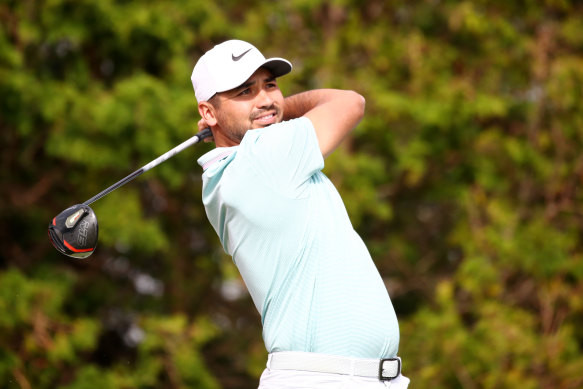 Jason Day hits his tee shot on the third hole. 