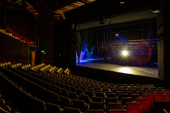 A "ghost light" keeps vigil at an empty Hamer Hall while the Arts Centre remains closed.