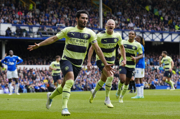 Manchester City’s Ilkay Gundogan celebrates after scoring his side’s opening goal during the English Premier League soccer match against Everton.