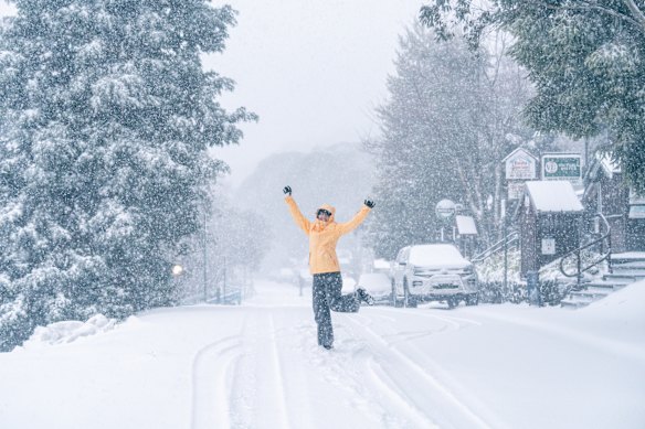 Falls Creek local Sarah Gamon celebrates 15cm of fresh snow on June 4.