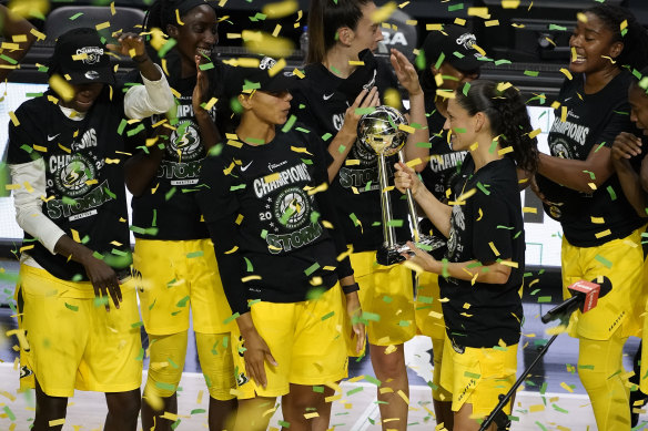 Australia's Ezi Magbegor (second from left) with her WNBA title-winning Seattle Storm teammates.