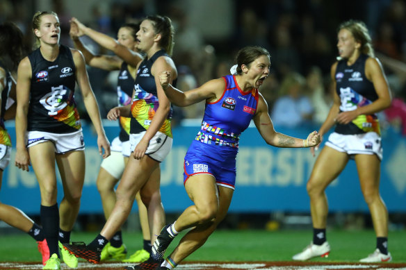 Captain Ellie Blackburn celebrates a memorable night for the Bulldogs.