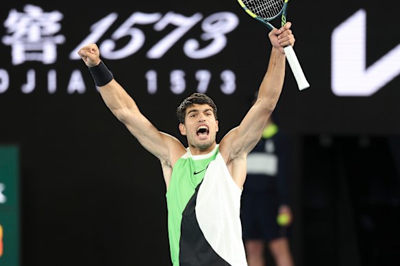 Carlos Alcaraz celebrates his win.
