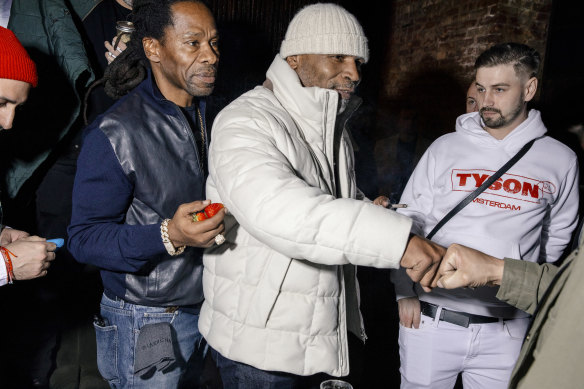 Mike Tyson greets fans at an event trumpeting his Tyson 2.0 cannabis line.