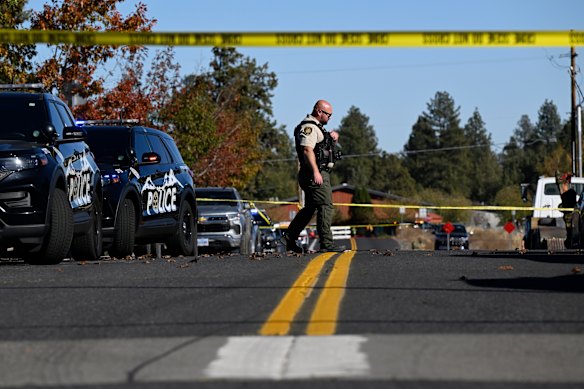 A sheriff’s deputy walks outside Silver Rail Elementary school, where a shooting took place on Thursday.
