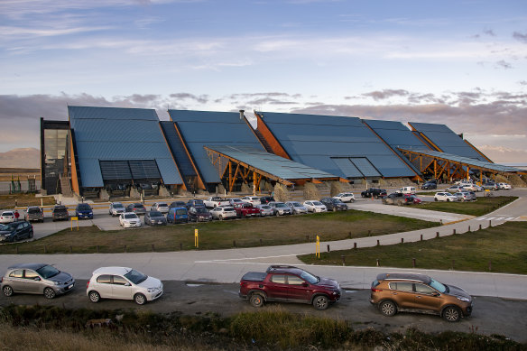 The airport exterior, a reference to the mountains beyond.