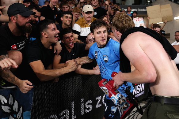 Max Burgess introduces himself to fans after scoring a cracker to give Sydney FC the lead. 