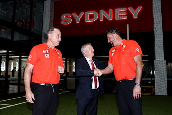 Swans chairman Andrew Pridham with former coach John Longmire and his successor, Dean Cox.