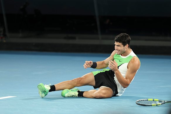 Carlos Alcaraz celebrates his win.