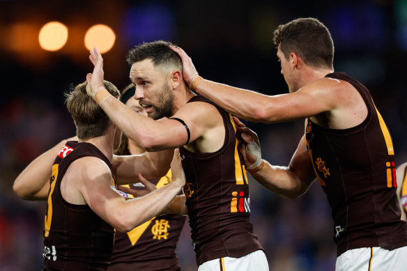 Hawks celebrate a goal.