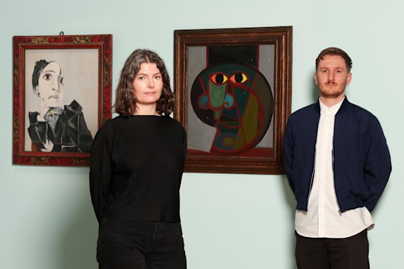 Australian Art curator Deirdre Cannon  and David Greenhalgh (right), curator of International Art, with Dora Maar with Green Gingernails 1936, and Portrait of Pablo Picasso, 1938.