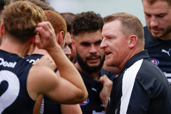Michael Voss urges on his players.