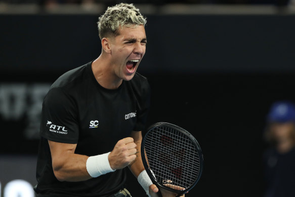 Thanasi Kokkinakis celebrates the win.