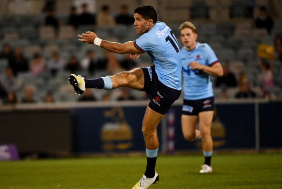 Ben Donaldson kicks long against the Brumbies. 