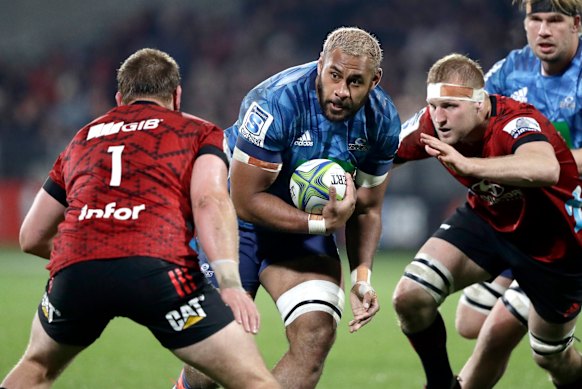 Blues Patrick Tuipulotu runs at the defence during the Super Rugby Aotearoa rugby game between the Crusaders and the Blues in Christchurch.