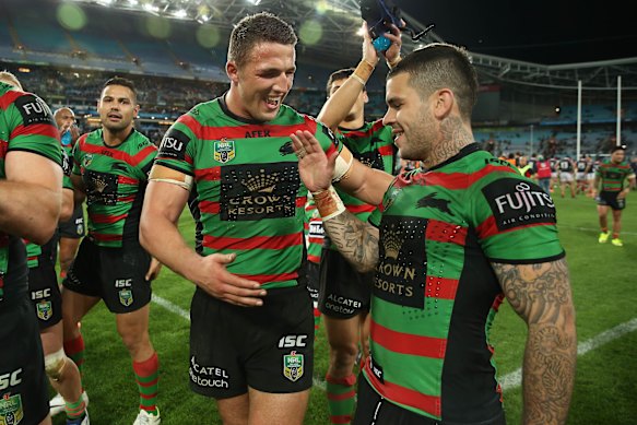 Adam Reynolds and Sam Burgess celebrate their preliminary final win over the Roosters in 2014. A week later they ended a 41-year title drought.