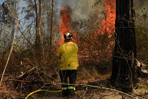 NSW Rural Fire Service controlling a bush fire from a property on Silverdale Road in Wallacia.