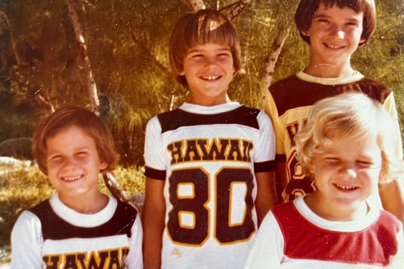 Beach days: author pictured (far left) with his brothers.